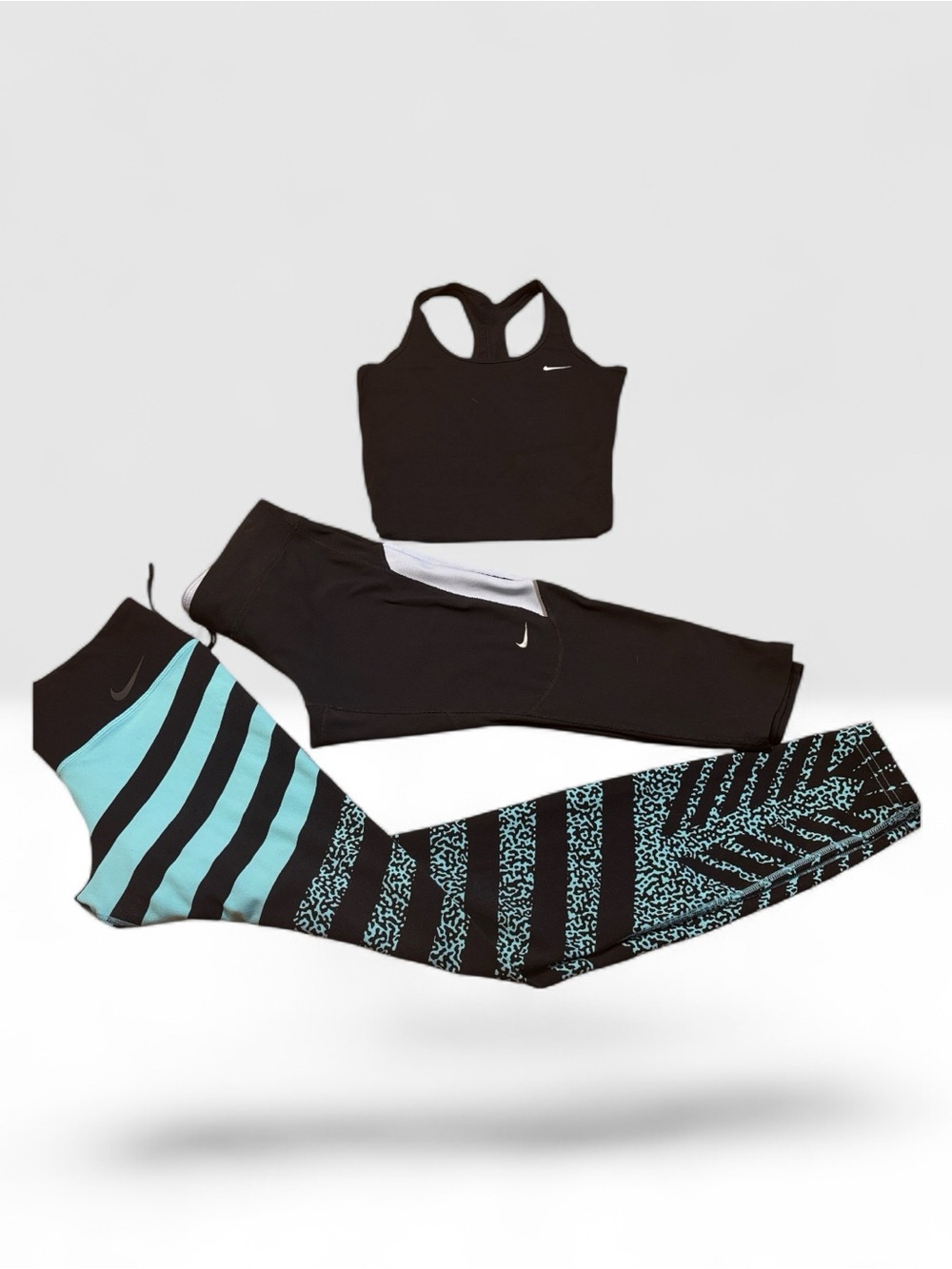 Nike Women’s Tights and Racer back tank top.